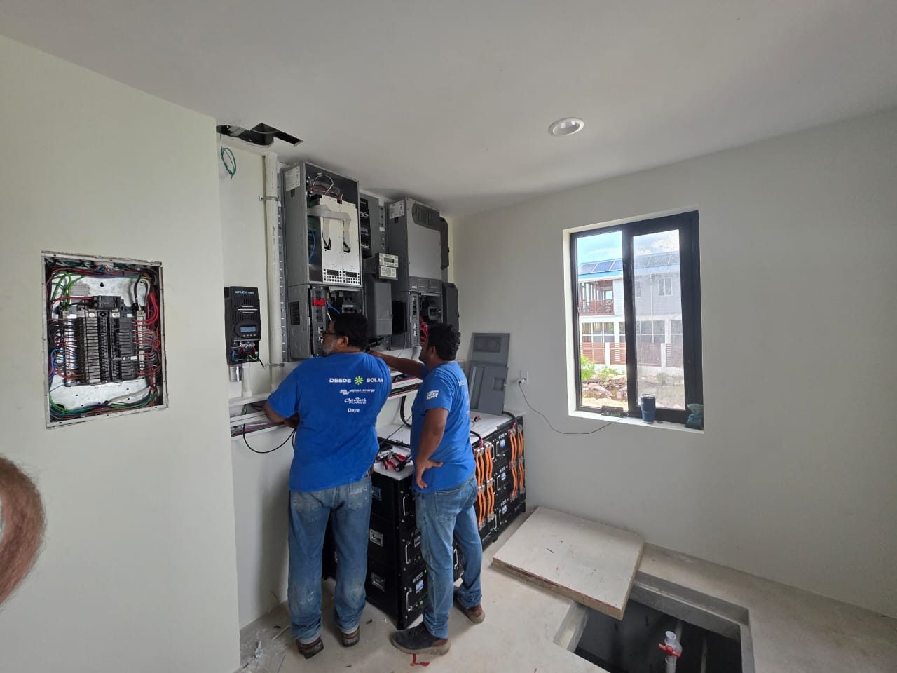 Two members of the Belizean crew during construction